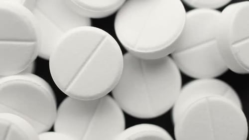 Medical Pills Placed on Rotating Table, Close Up