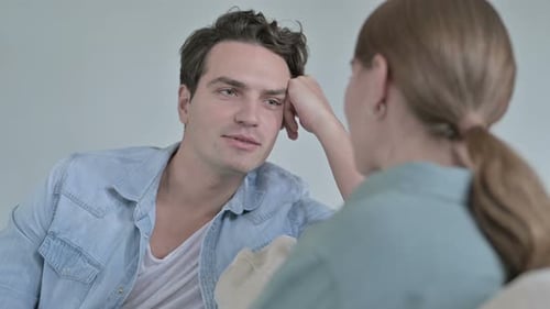 Young Man and Woman Chatting Close Up