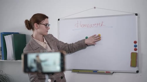Woman Teaching Math with Magnets at Home