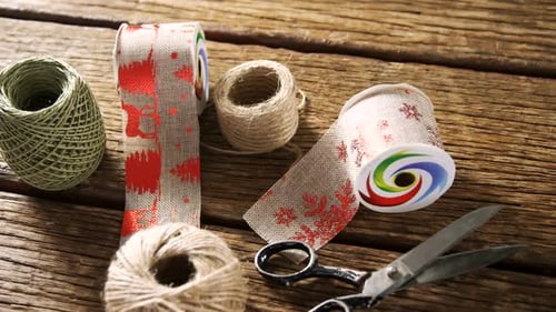 Festive Ribbons and Twine on Rustic Wood