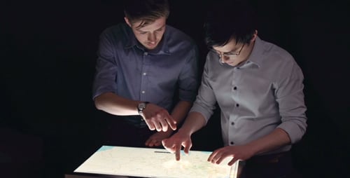 Men use interactive digital touchscreen display
