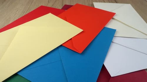 Falling multi-colored envelopes.