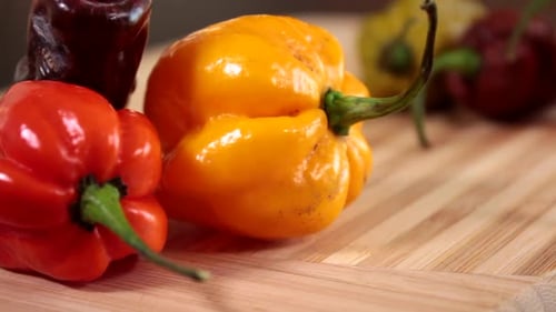 Colorful Fresh Habanero Peppers on Cutting Board