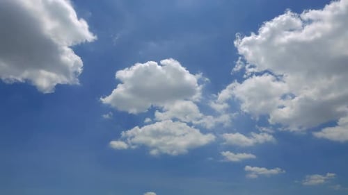 Time lapse of white cloud moving pass around sky background