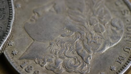 Rotating stock footage shot of American coins