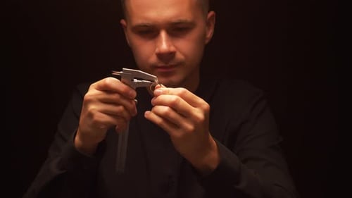 Man Measuring Ring with Caliper Tool