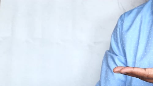 Close Up of Young Man Hand Using Sanitizer Gel for Preventing Virus