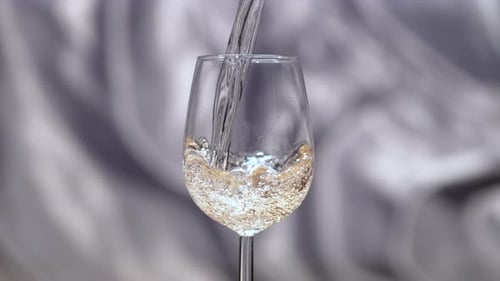 Wine Being Poured into Glass Close Up