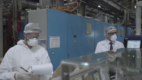 Scientists working in laboratory