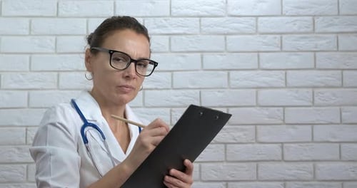 Doctor Practitioner at Paper Work