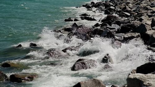 Slow Motion View of Ocean Water Waves And Rocks