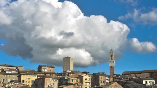 Urban Buildings with Towering Cumulus Clouds