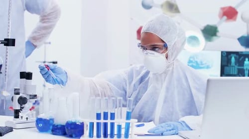 Scientist Working in Clean Modern Laboratory