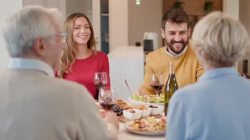 Family Celebrates Together at a Festive Meal