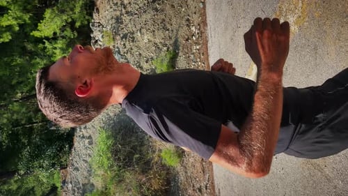 Young Adult Male Exercising on a Rural Path