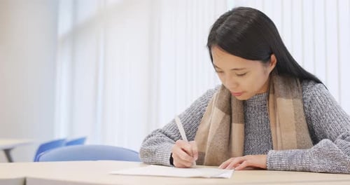 Student Doing Revision at Library