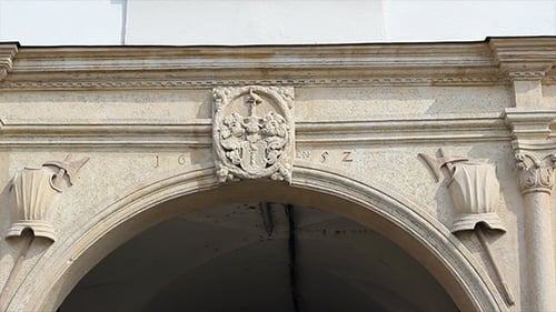 Historical Stone Archway Featuring Intricate Carvings