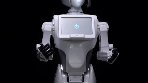 Die Hand des Roboters bewegt seine Finger. Schwarzer Hintergrund. Nahaufnahme