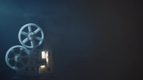 Vintage Film Projector Reels in a Smoky Room