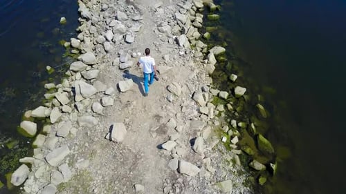 Photographer Take Pictures. Photographer taking pictures of nature against the lake