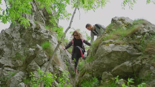Hikers descending a mountain