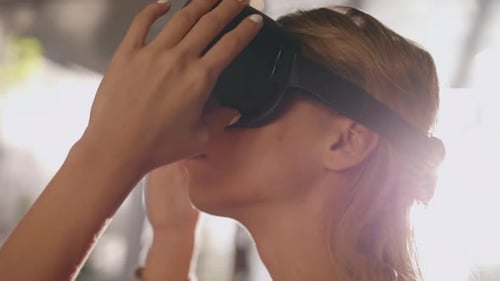 Woman Experiencing Virtual Reality Headset Technology