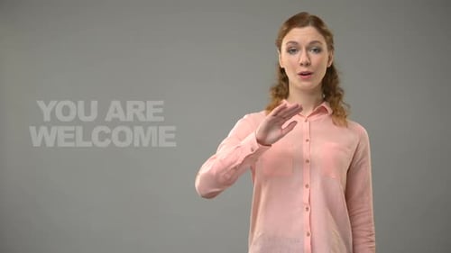 Deaf Female Saying You Are Welcome in Asl, Text on Background, Interpreter