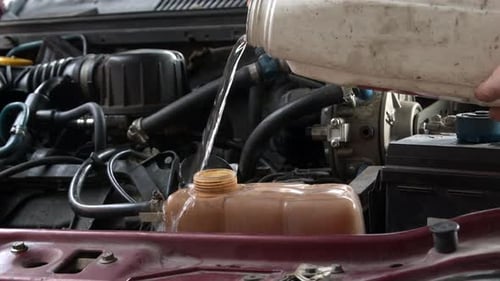 Car Engine Coolant Refill Close Up
