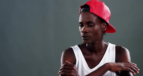 Stylish Young Adult Poses with Confidence Indoors