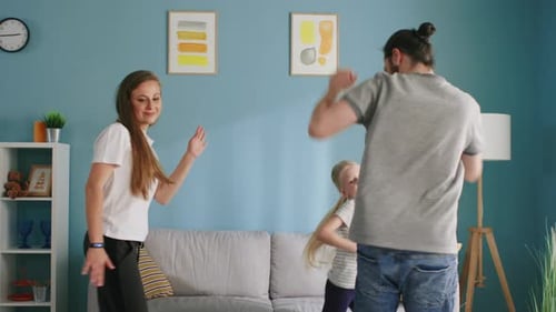 Family Fun: Dancing Together in Living Room