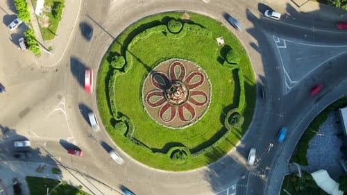 Aerial View Timelapse of Roundabout Road with Circular Cars in Small European City at Sunny Summer