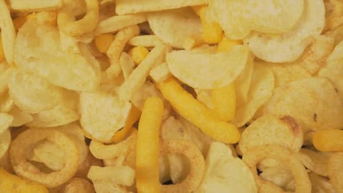 Assortment of Delicious Crispy Chips and Snacks