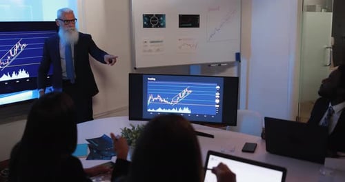 Business people talking about new trading strategies inside bank meeting room