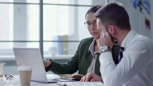 Joyous Colleagues Working Together in Office