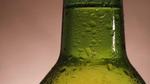 Green Beer Bottle Rotate and Close-up in Slow Motion