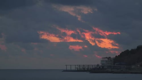Fiery Sunset Over a Calm Sea