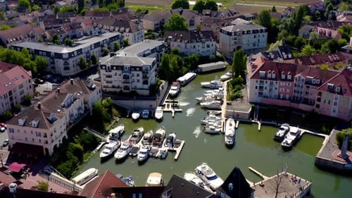 Aerial view of a small town surrounded by a river.