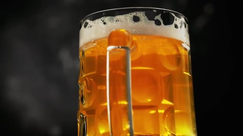 Close up Beer Mug Rotating Showing Golden Liquid