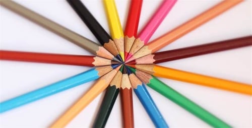 Vibrant Colored Pencils Arranged in Star Pattern
