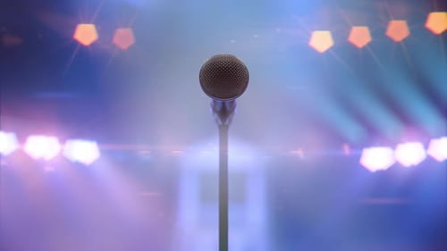 Microphone and Colorful Spotlights Moving with the Rhythm of the Music and Sound