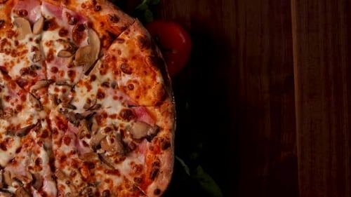 Delicious Fresh Pizza with Ham and Mushrooms