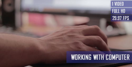 Typing on Computer with Mouse in Office