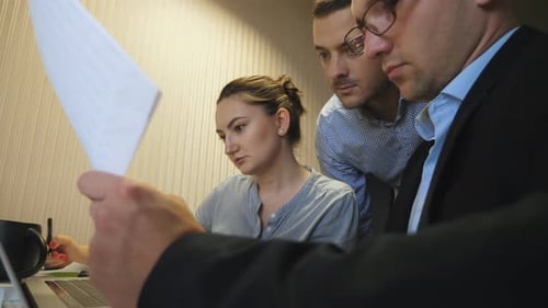 Business People Working on Computer in an Office
