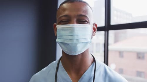 Close Up of Medical Worker in Mask Smiling
