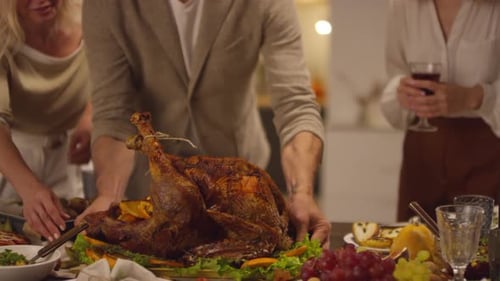 Putting Roasted Turkey On Table