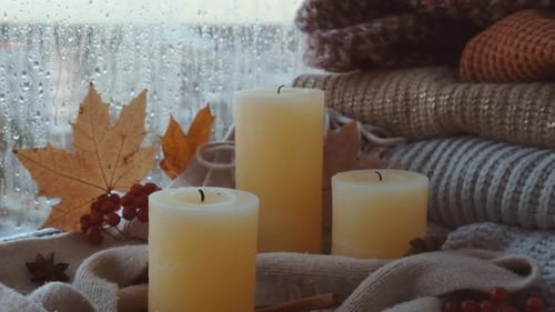 Candles by a Window with Fall Decorations