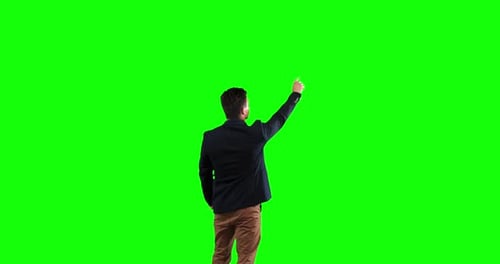 Caucasian man in a green background