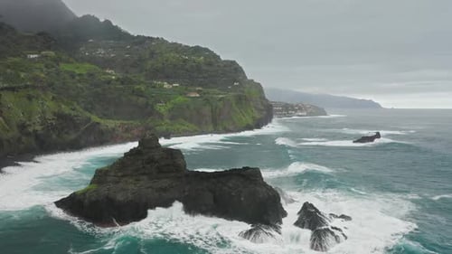 Aerial Footage of Isolated Island Washed with Sea Waters