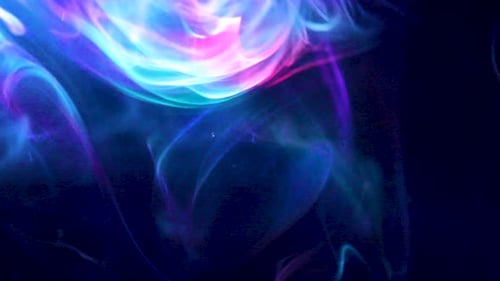 colored spotlights reflected in the smoke 4k