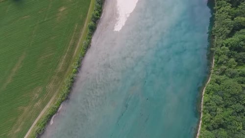 Aerial View of Rural Landscape with Fields and River in Norway